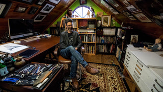 Portrait of the artist Greg Ruth inside his studio.