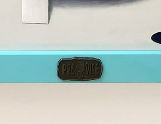 Close-up of a logo on a product with a blue stripe in the background