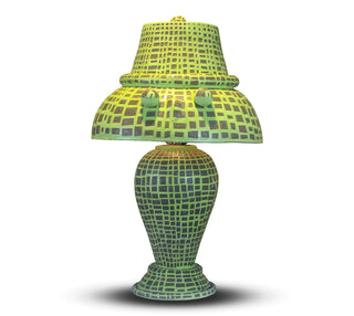 Green mosaic table lamp on a white background