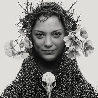 Black and white drawing of a woman wearing a chain mail hood with flowers