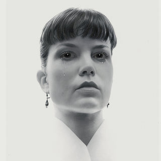 Black and white drawing of a woman crying